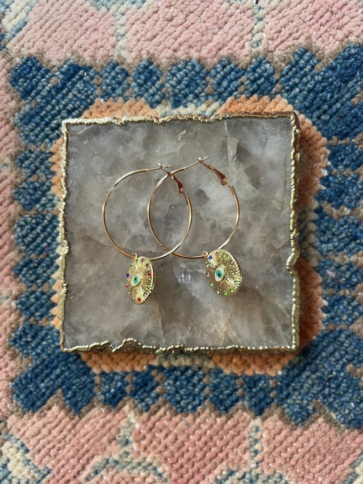 Small eye hoop earrings