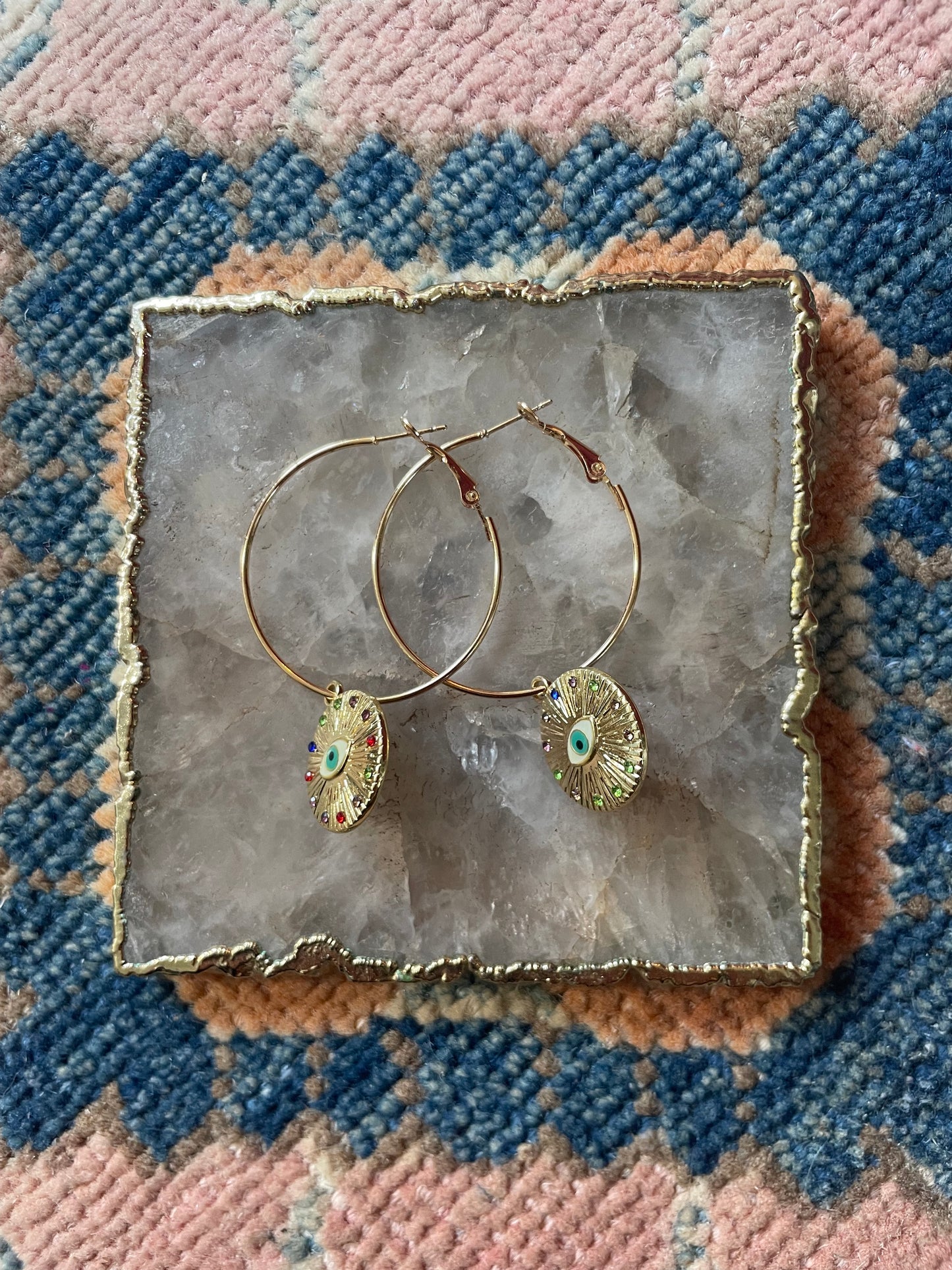 Small eye hoop earrings