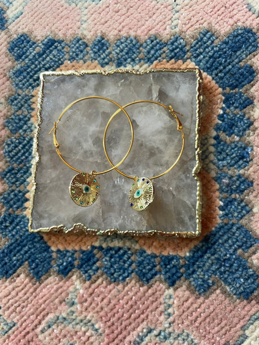 Big eye hoop earrings